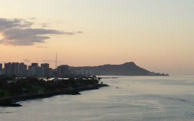 Sunrise over Diamond Head in Honolulu Hawaii Golden Princess arrives in Honolulu at dawn with Diamond Head in the background