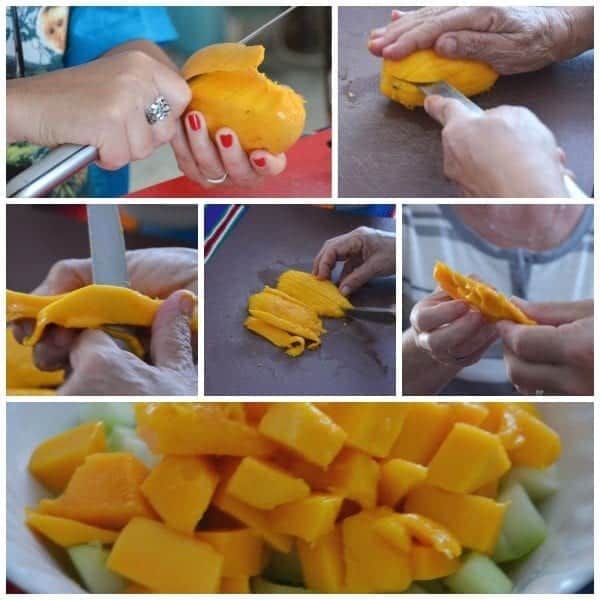 Peel, halve, slice around the pit. Then dice. The lucky person gets to gnaw the fruit off the pit.