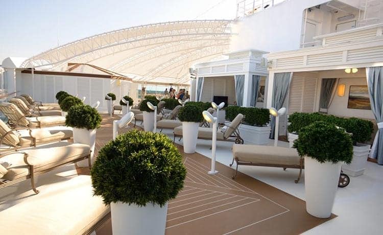 The Sanctuary. You can show up or make reservations ahead of time to guarantee a lounger. Not too crowded on port days.