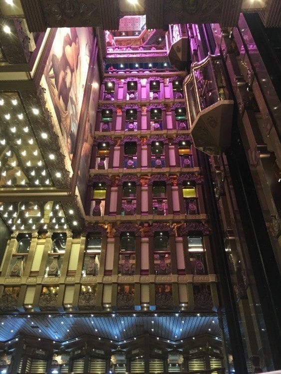 Rainbow-hued atrium with two glass elevators. Fun to ride up and down and watch the people below.