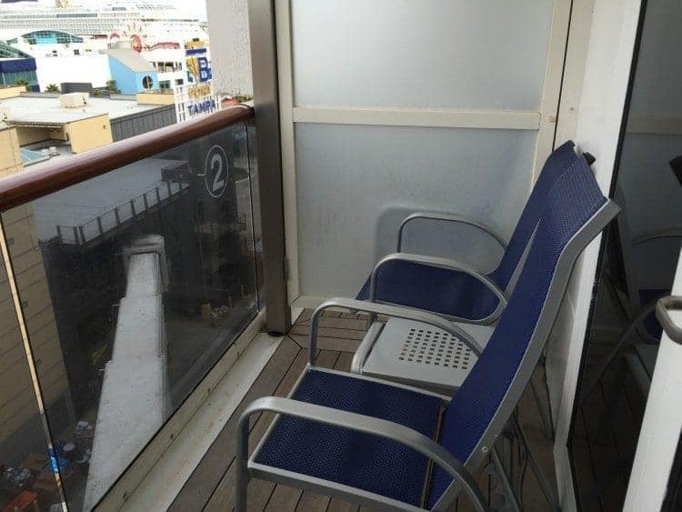 Nice sized balcony and one of the chairs has a reclining back.