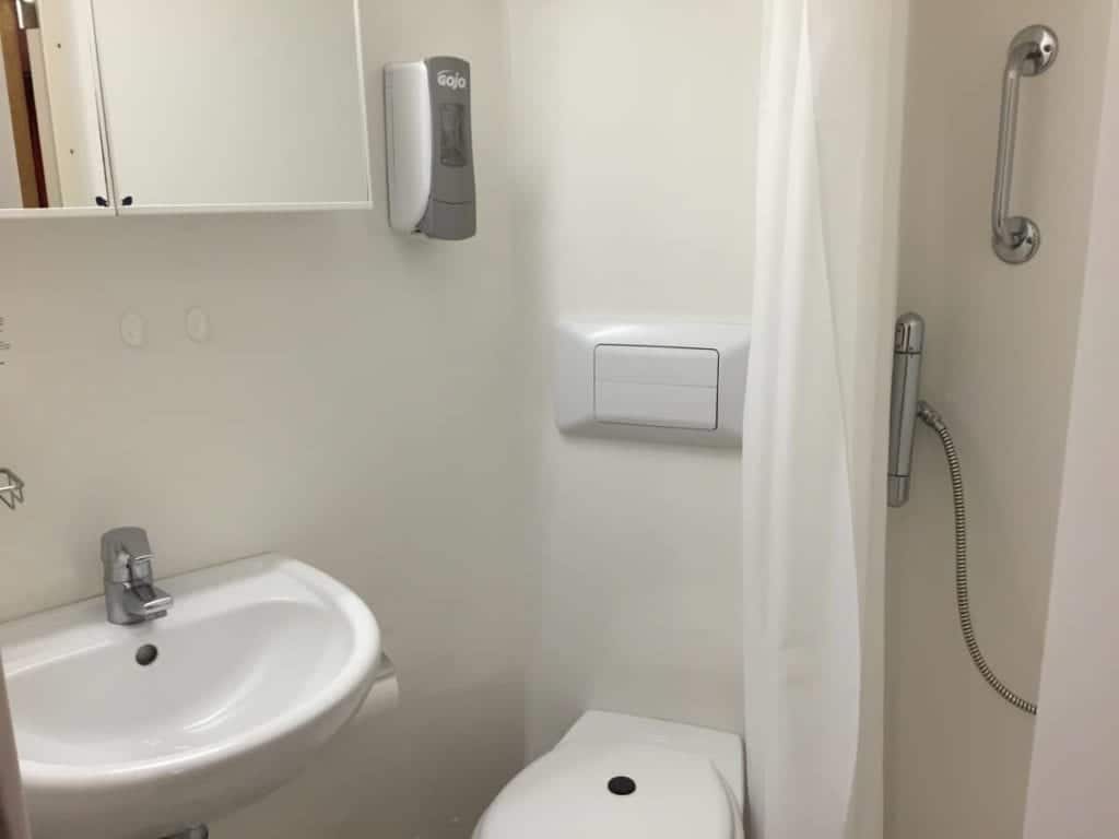 The small bathroom was very clean and best used by one person at a time.