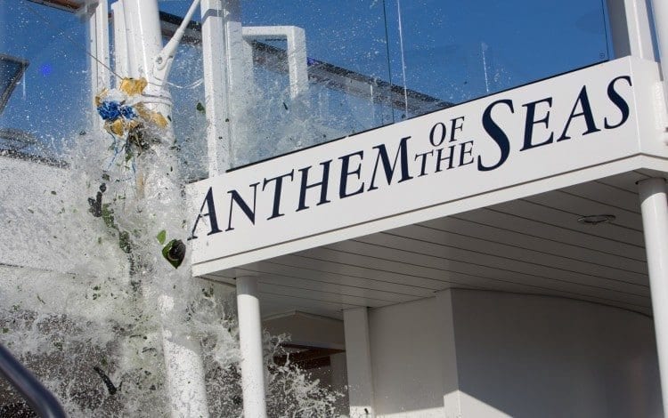 Champagne bottle breaks against the hull of the Anthem of the Seas. officially capping the naming ceremony.