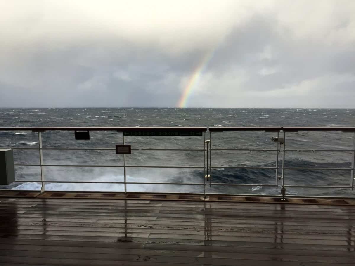 Rainbow and rough seas on the North Atlantic. Prevent getting seasick.