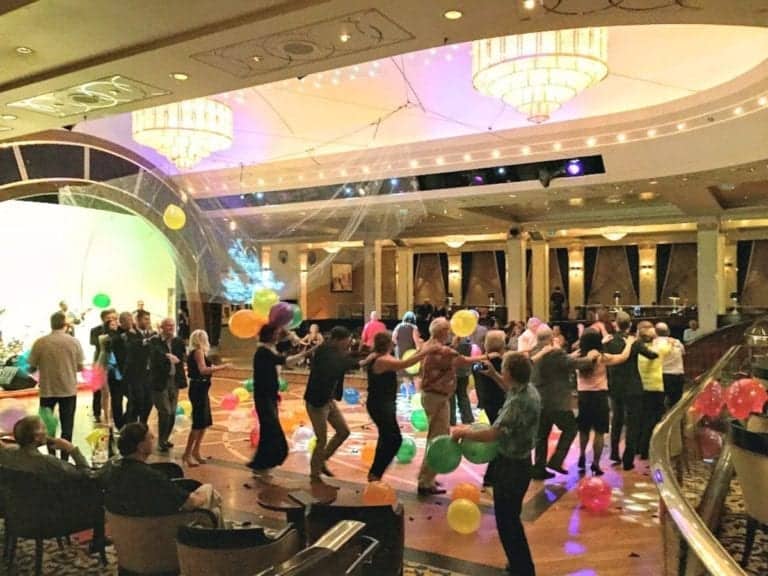 Queen Mary 2 cruise activities include conga dance line.