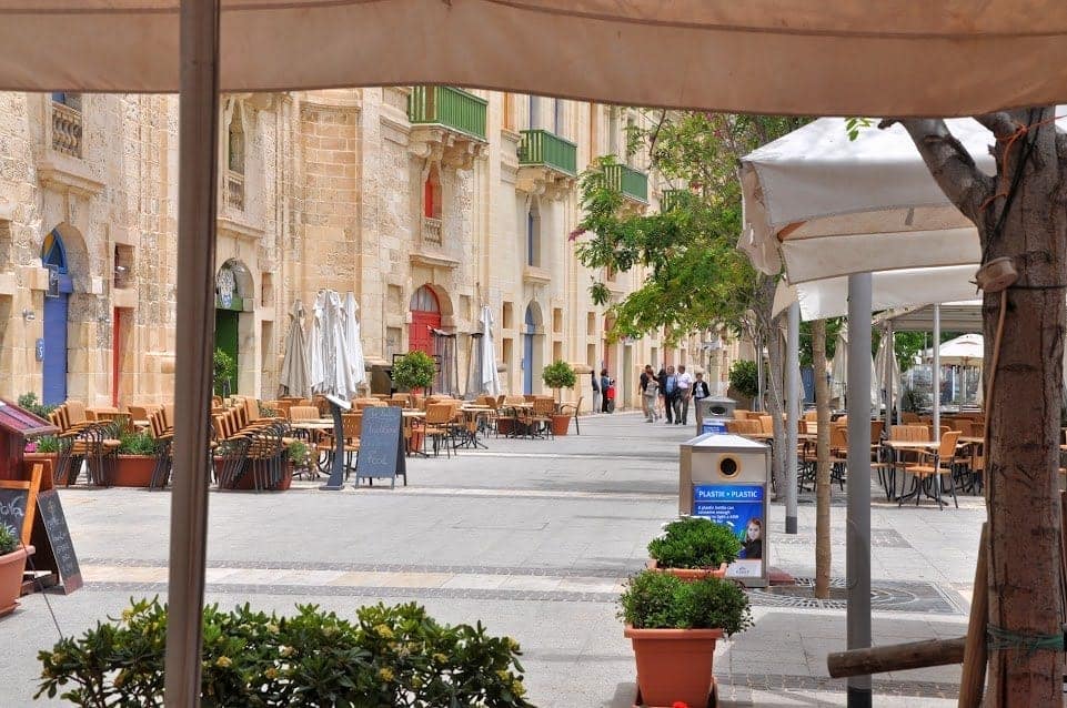 Valletta Malta promenade dotted with cafรฉs.