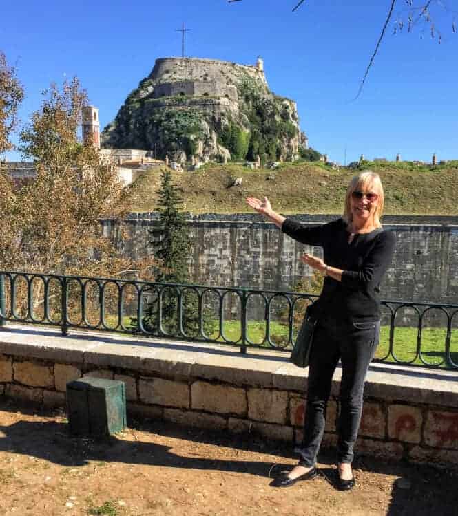Sherry standing in front of the Old Fortress in Corfu, Greece.