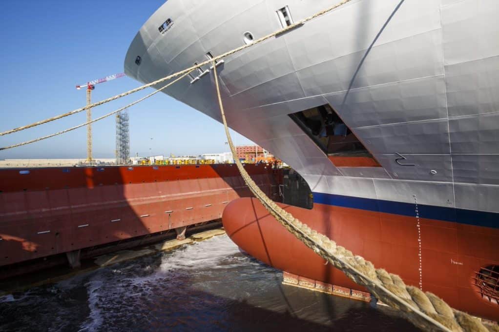 Viking Neptune in the building dock as water flows in to touch the ship.