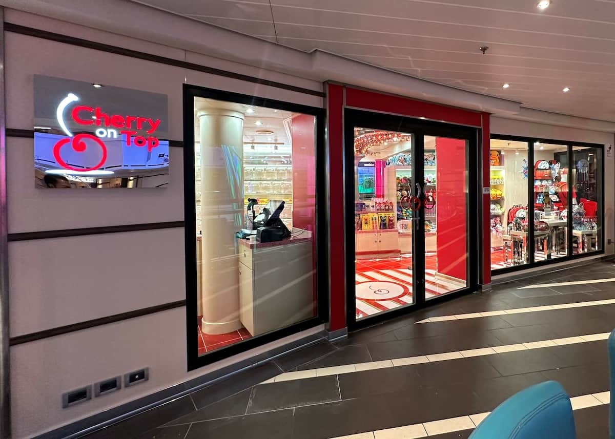 Entrance doors to Cherry On Top candy store.