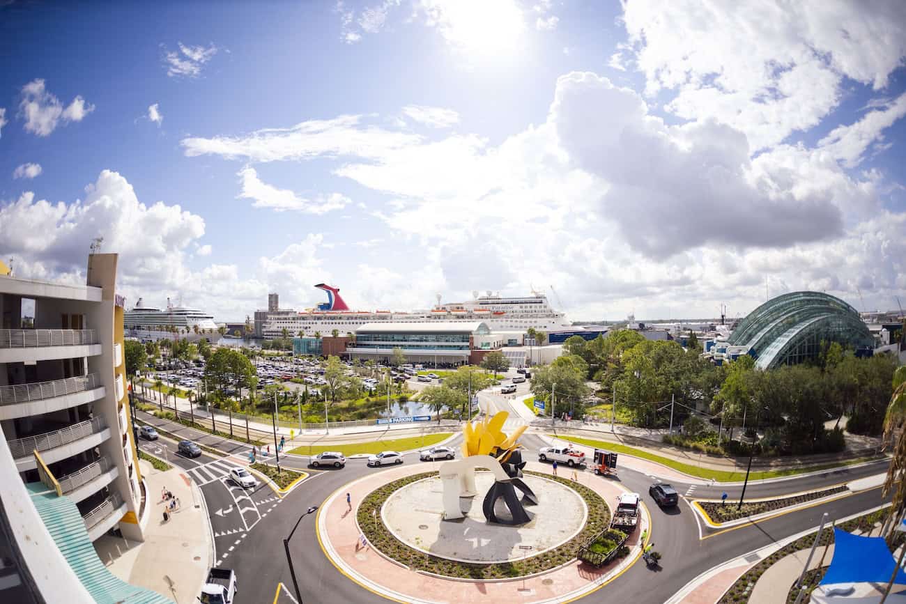 Wide-angle view of Port Tampa Bay with cruise ships in the background.