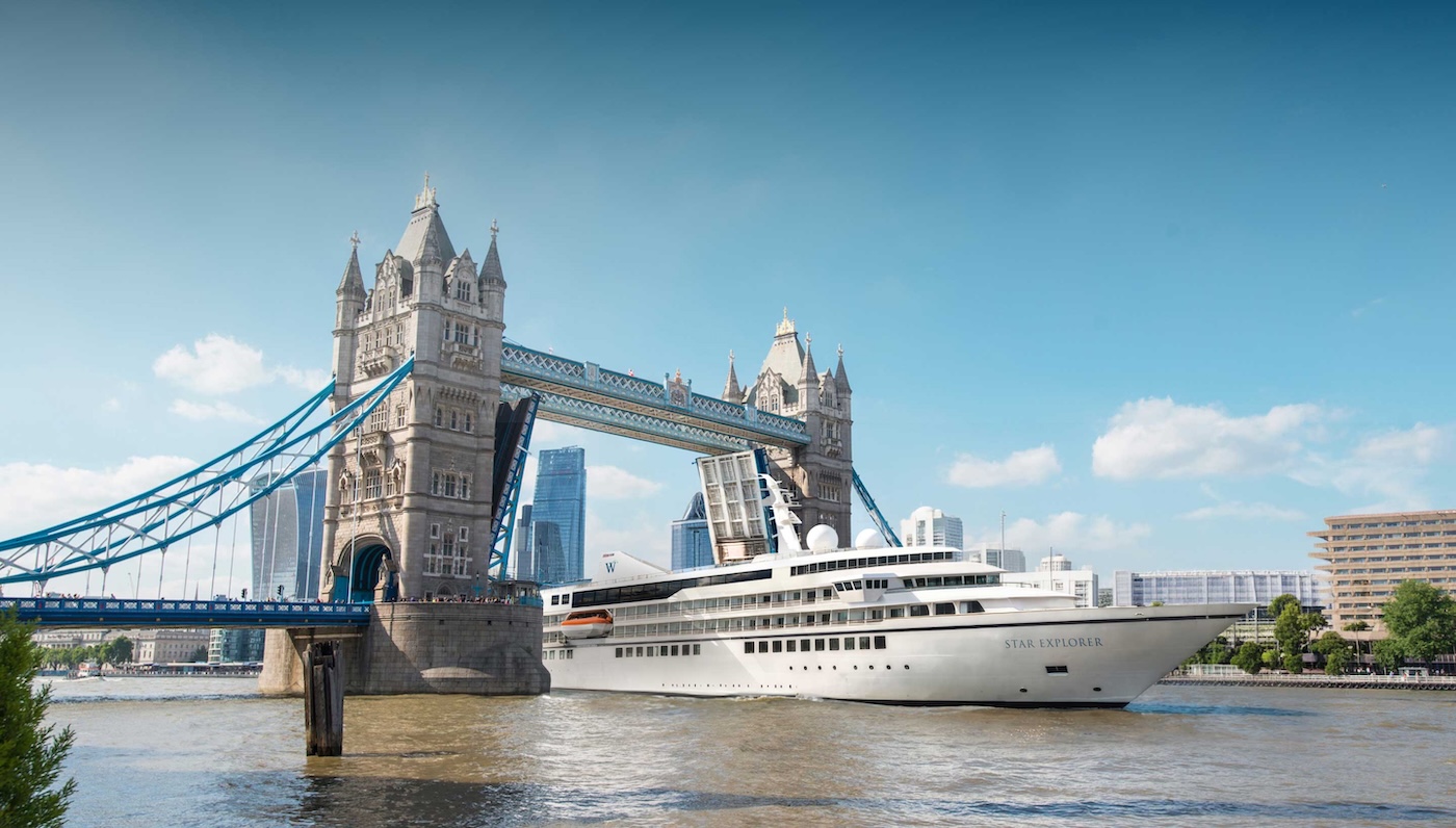 Windstar Cruises' new Star Explorer passes under Tower of London en route to river to ocean cruise.