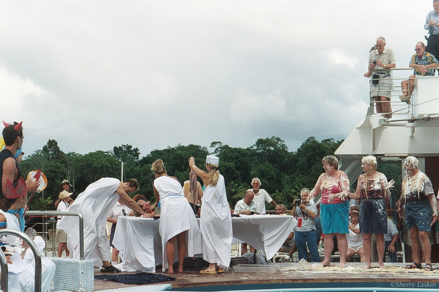 Pollywog to Shellback equator crossing ceremony with people covered with spaghetti and fish!